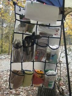 One way to organise yourself when camping:  A shoe organizer turned camsite organizer. Other handy camping gear at: http://www.everintransit.com/camping-checklist/